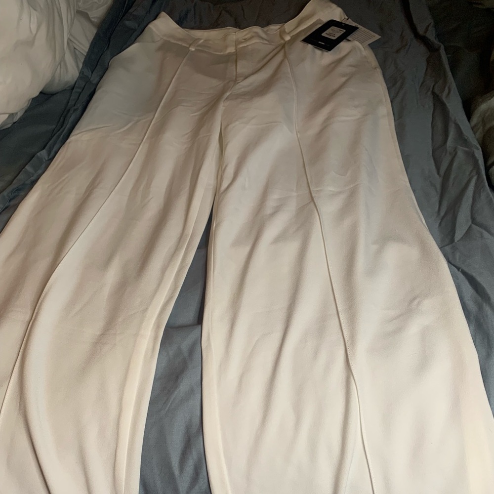White flare pants